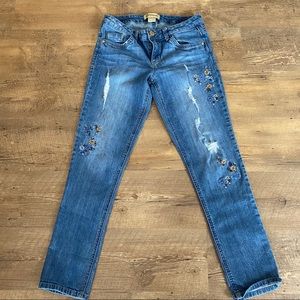 Embroidered girlfriend jeans.